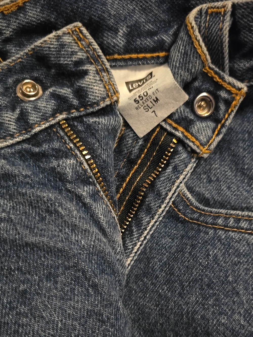 Levi's Men's Slim Jeans in Medium Blue Denim with Gold Stitching